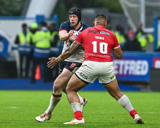Chris Hill of England is tackled by Tevita Tatola of Tonga during the Rugby League International match England vs Tonga at John Smith's Stadium, Huddersfield, United Kingdom, 28th October 2023

(Photo by Craig Thomas/News Images)