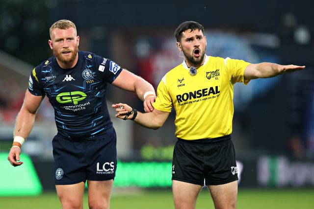 Luke Thompson of Wigan Warriors and Referee Aaron Moore during the Betfred Super League round 15 match Wakefield Trinity vs Wigan Warriors at DIY Kitchens Stadium, Wakefield, United Kingdom, 20th June 2025(Photo by Sam Eaden/News Images)