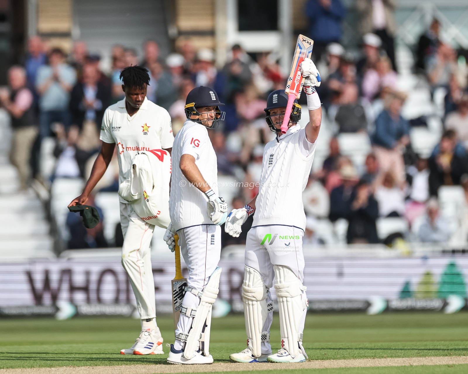 Ollie Pope of England celebrates a century and half as he notches up 150 runs during the Rothesay Test Match Day 1 England vs Zimbabwe at Trent Bridge, Nottingham, United Kingdom, 22nd May 2025

(Photo by Mark Cosgrove/News Images)