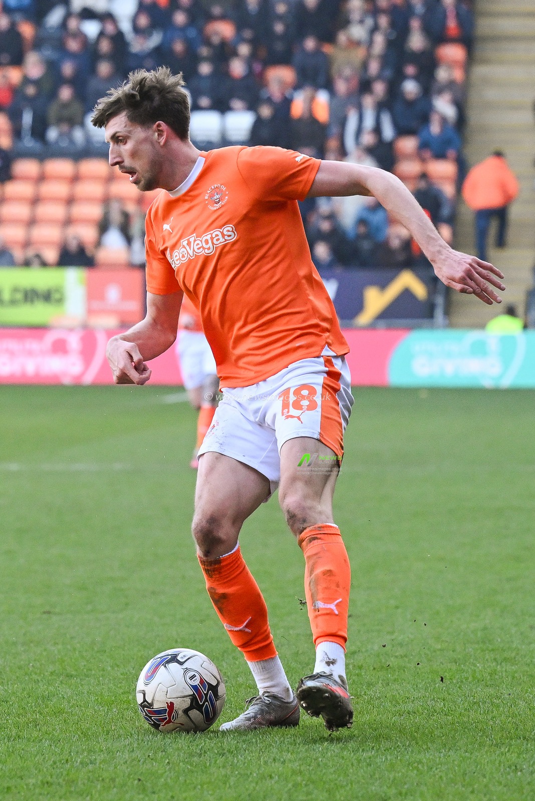 Jake Beesley of Blackpool makes a break with the ball during the Sky Bet League 1 match Blackpool vs Portsmouth at Bloomfield Road, Blackpool, United Kingdom, 9th March 2024

(Photo by Craig Thomas/News Images)