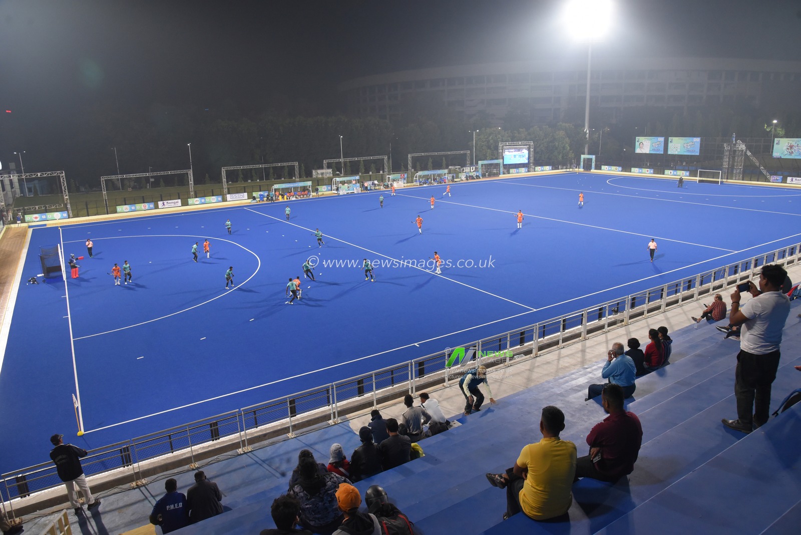 Pepole wach hockey match during 126th Beighton Cup semi final match between India Airforce and Canara Bank in Vivekananda Yuba Bharati Hockey Stadium, Kolkata, India, on November 15, 2025. The score is India Airforce  - 2 and Canara Bank-0.Photo by Debajyoti Chakraborty.