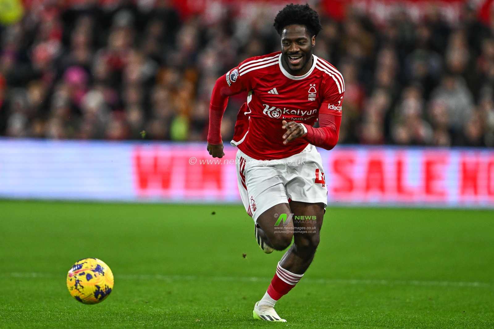 Ola Aina of Nottingham Forest makes a break with the ball during the Premier League match Nottingham Forest vs Manchester United at City Ground, Nottingham, United Kingdom, 30th December 2023

(Photo by Craig Thomas/News Images)