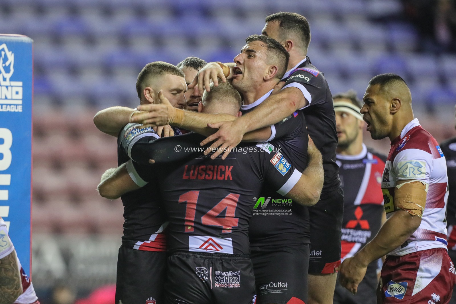 4th October 2019, DW Stadium, Wigan, England; Betfred Super League Semi Final, Wigan Warriors v Salford Red Devils : Joey Lussick (14) of Salford Red Devils celebrates his try 

Credit: Mark Cosgrove/News Images