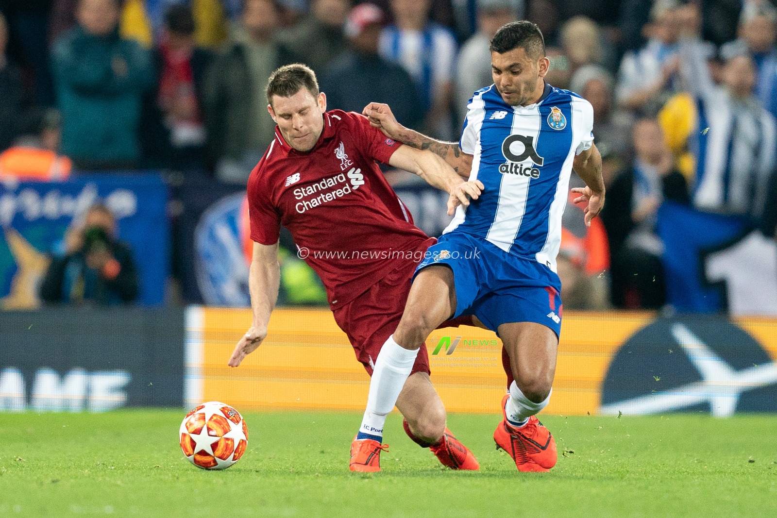 Liverpool's James Milner  battles with Portoâ€™s Jesus Corona

9th April 2019 , Anfield Stadium, Liverpool, England;  EUFA Champions League Quarter Final, First Leg, Liverpool FC vs FC Porto 

Credit: Terry Donnelly/News Images