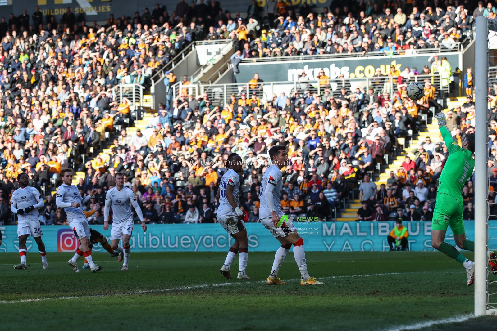 James Shea #1 of Luton Town saves a shot on. Goal from Keane Lewis-Potter #11 of Hull City