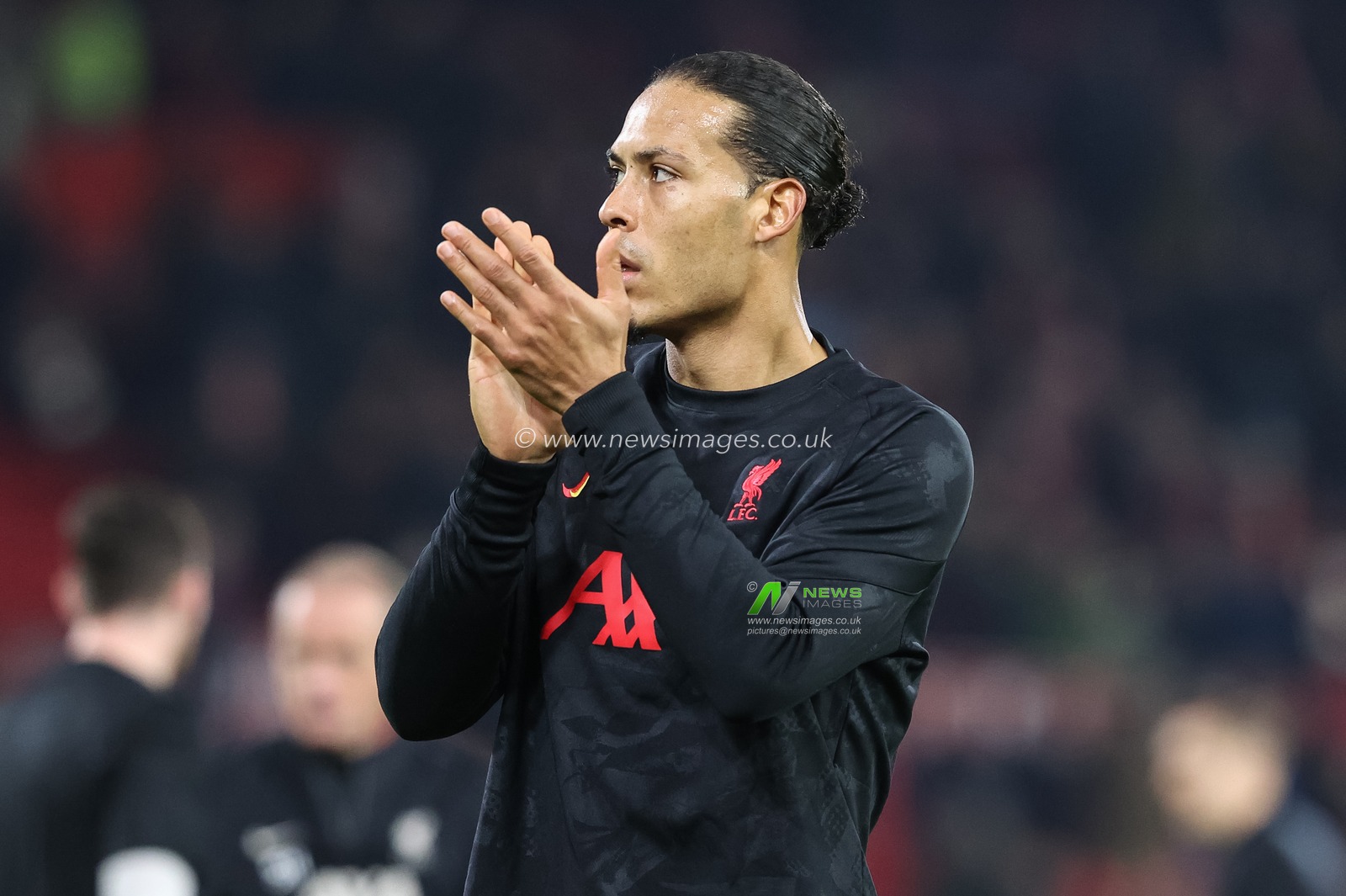 Virgil van Dijk of Liverpool applauds the travelling fans during the Premier League match Nottingham Forest vs Liverpool at City Ground, Nottingham, United Kingdom, 14th January 2025

(Photo by Alfie Cosgrove/News Images)