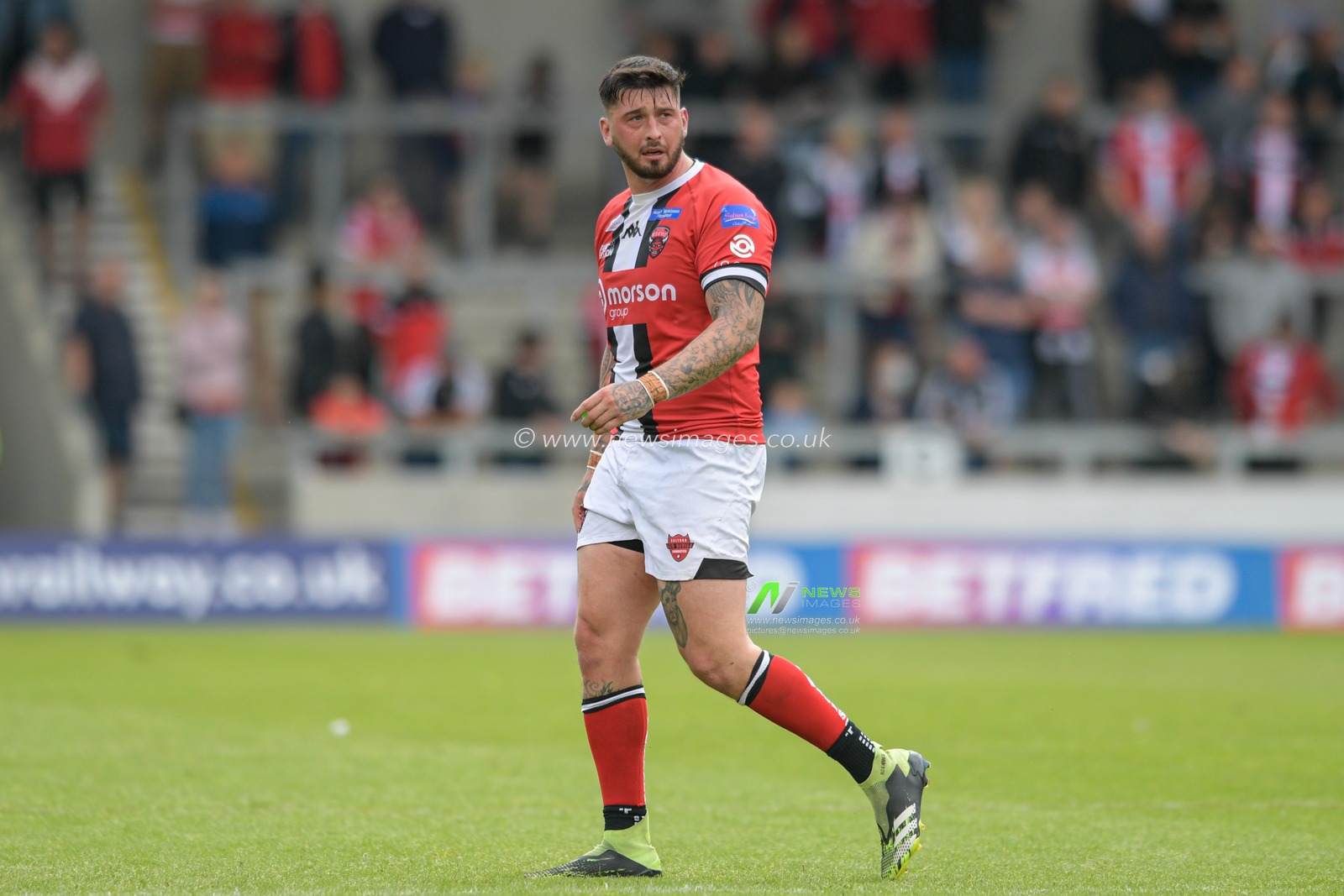 Oliver Roberts (15) of Salford Red Devils in action during the game