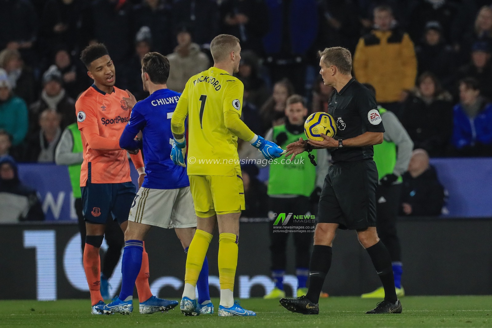 1st December 2019, King Power Stadium, Leicester, England; Premier League, Leicester City v Everton : referee Graham Scott picks the ball up off the penalty spot after a var rules out a penalty 


Credit: Mark Cosgrove/News Images
