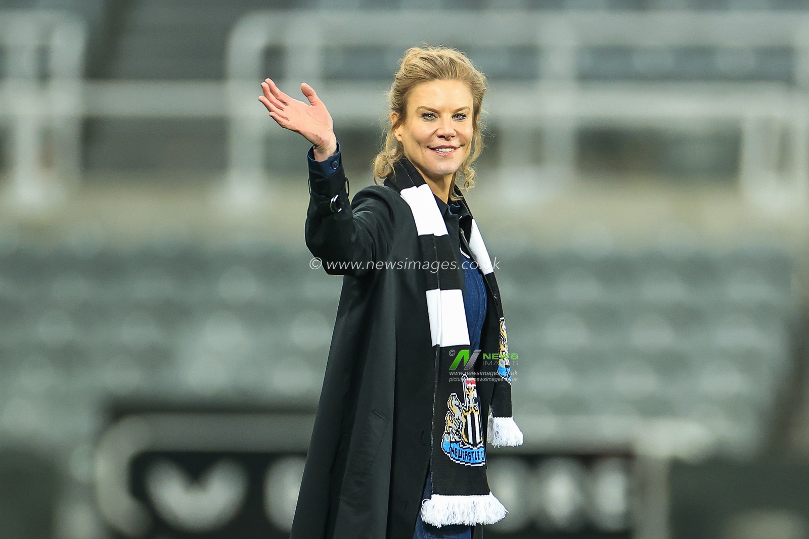 Newcastle United co-owners Amanda Staveley waves to the fans from the pitch after the game