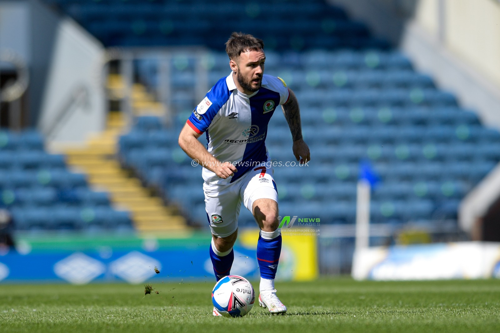 Adam Armstrong #7 of Blackburn Rovers runs forward with the ball
