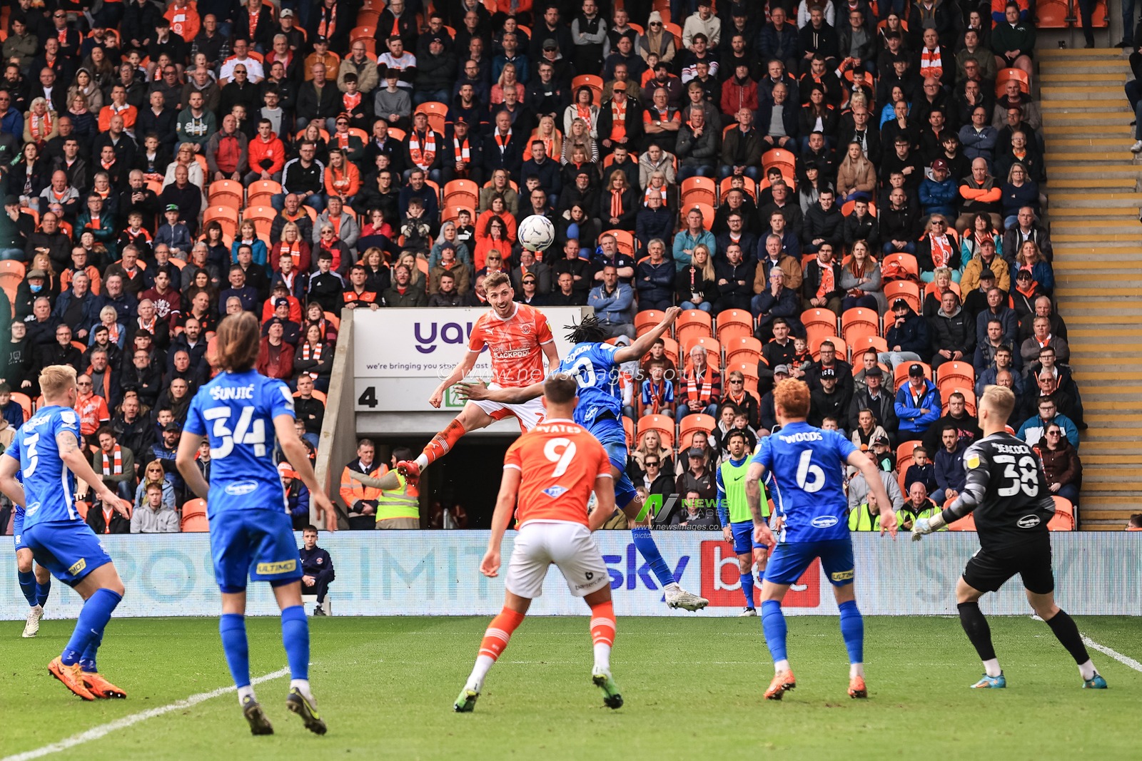 Jake Beesley #28 of Blackpool heads on goal