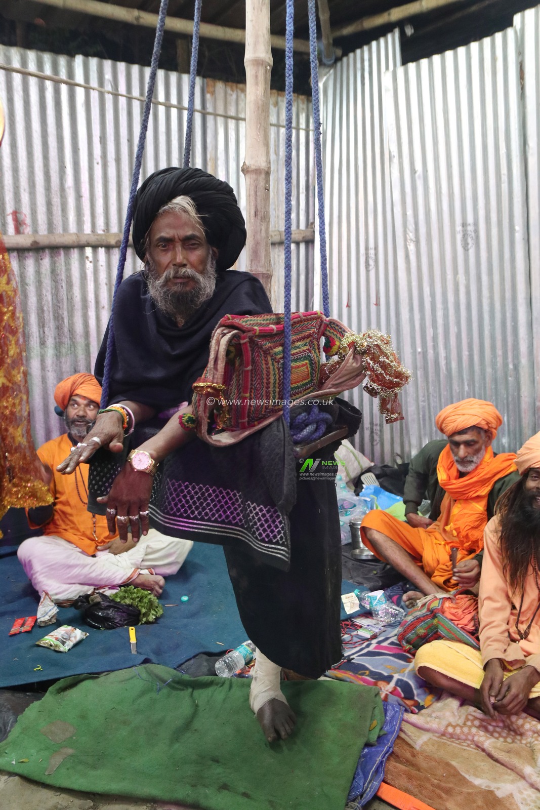 A Sadhu at a transit camp for the upcoming auspicious Hindu religious festival Gangasagar Mela, in Kolkata on January 5, 2025. The Gangasagar Mela is an annual Hindu festival held at Gangasagar, West Bengal, where the Ganges River meets the Bay of Bengal. The fair takes place at Kapilmuni's ashram on Gangasagar every year on Makar Sankranti.Pictures by Debajyoti Chakraborty.(Photo: Debajyoti Chakraborty/News Images)