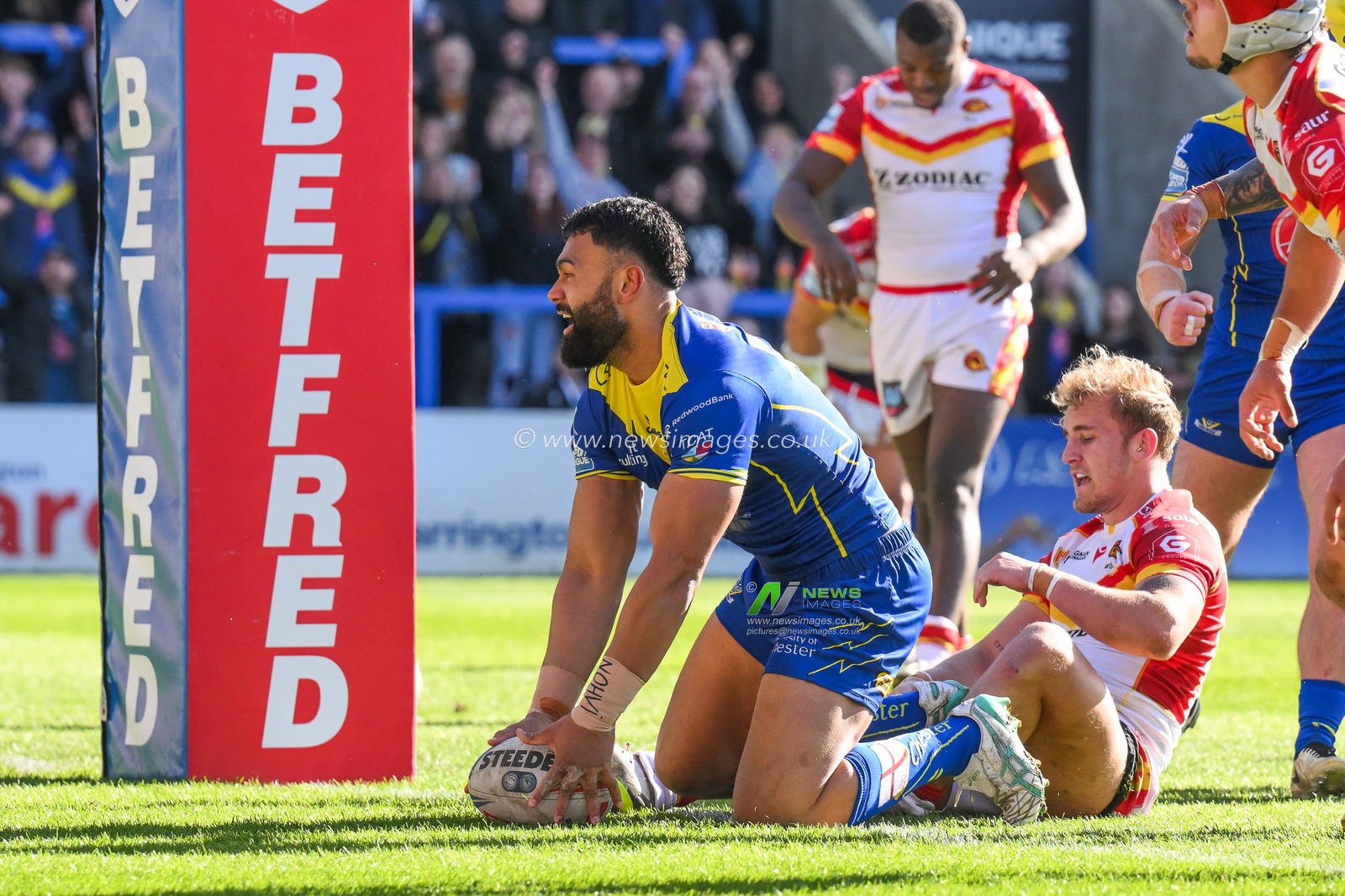 Zane Musgrove of Warrington Wolves goes over for a try during the Betfred Super League match Warrington Wolves vs Catalans Dragons at Halliwell Jones Stadium, Warrington, United Kingdom, 30th March 2024

(Photo by Craig Thomas/News Images)