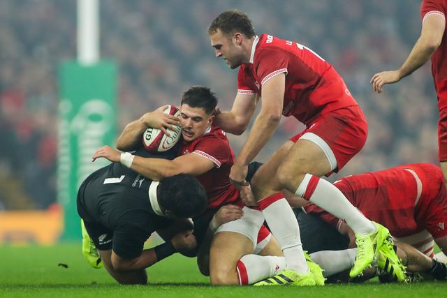 Joe Hawkins of Wales is tackled during the Quilter Nations Series 2025 match Wales vs New Zealand at Principality Stadium, Cardiff, United Kingdom, 22nd November 2025

(Photo by Andrew Lewis/News Images)

*** GER AUT SUI OUT ***