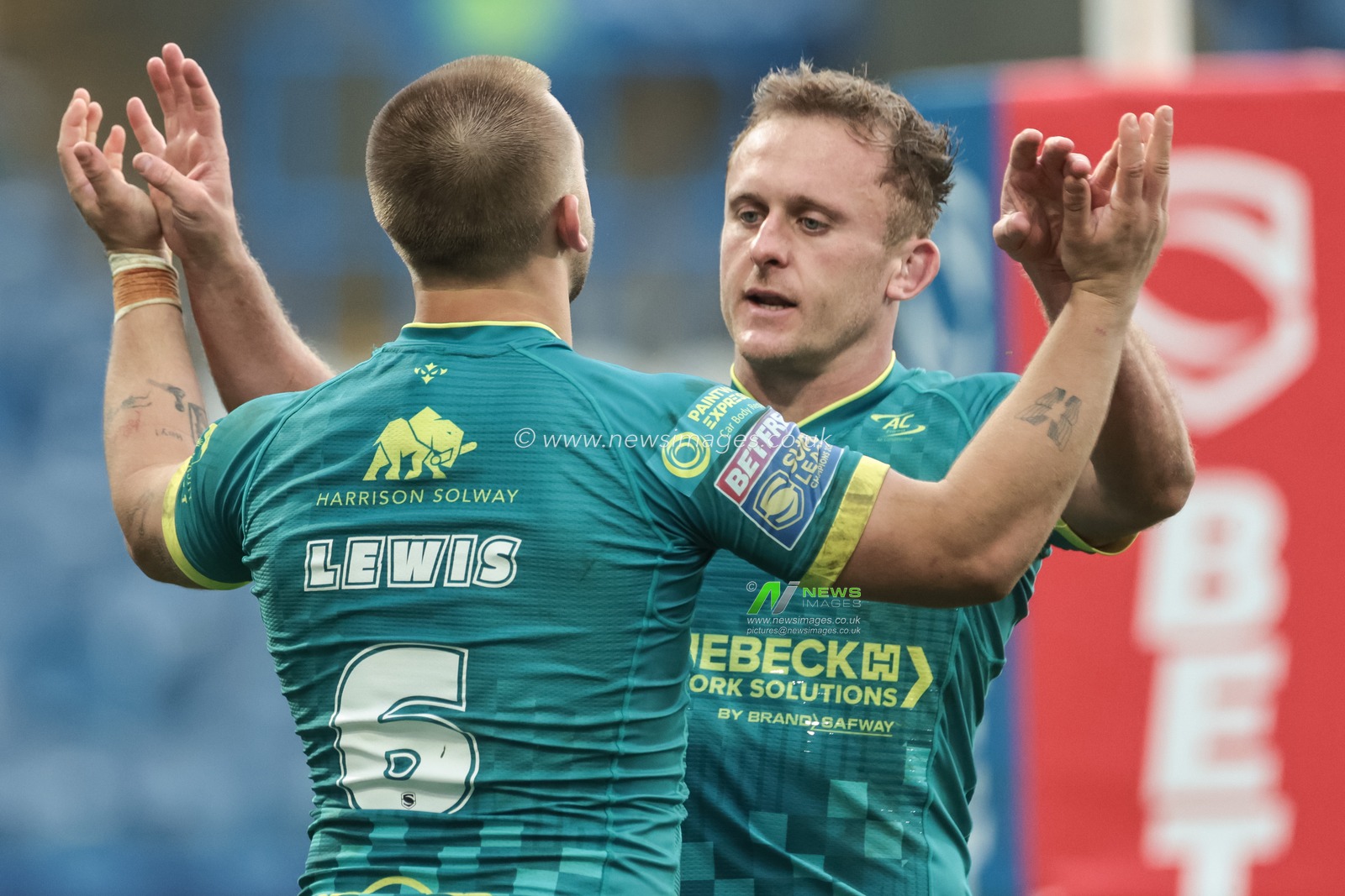 Mikey Lewis of Hull KR celebrates his try with Jez Litten during the Betfred Super League Round 4 match Huddersfield Giants vs Hull KR at Accu Stadium, Huddersfield, United Kingdom on 08 March 2026

(Photo by Mark Cosgrove/News Images)