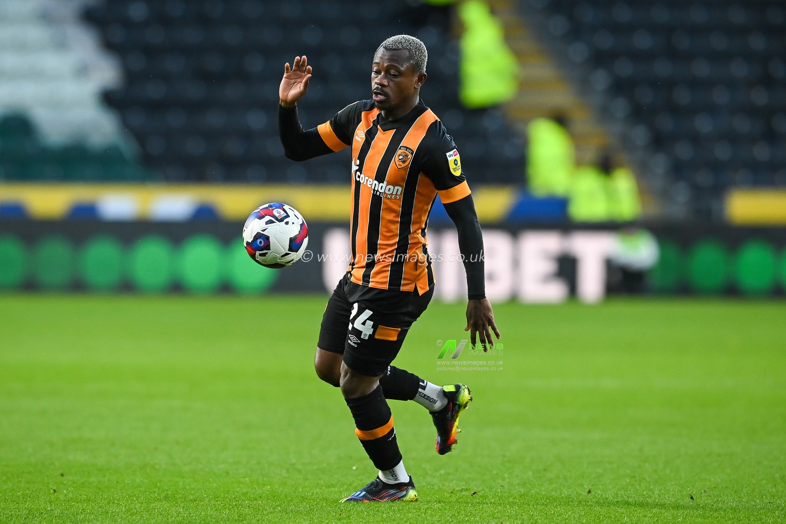 Jean MichaÃ«l Seri #24 of Hull City in action during the Sky Bet Championship match Hull City vs Blackpool at MKM Stadium, Hull, United Kingdom, 26th December 2022

(Photo by Craig Thomas/News Images)