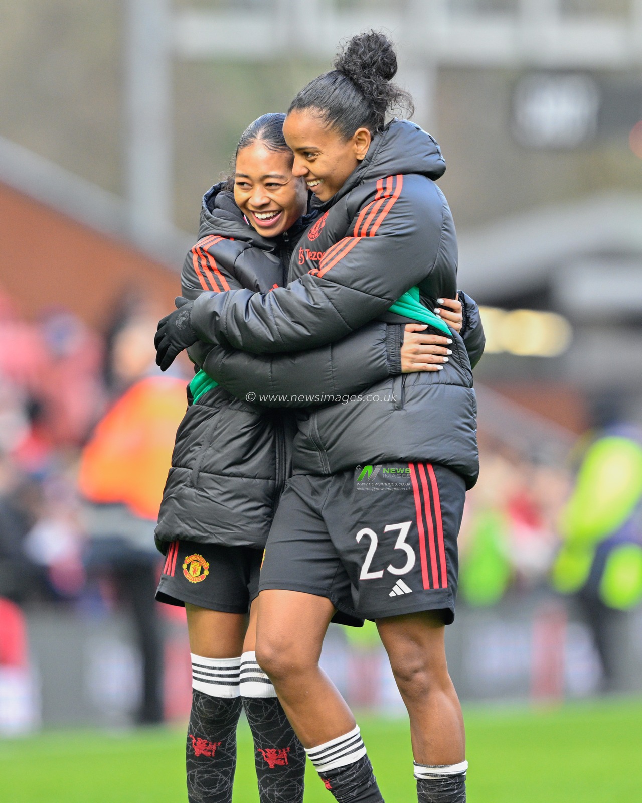 Jayde Riviere of Manchester United Women and Geyse of Manchester United Women embrace at full time, during the Vitality Women's FA Cup match Manchester United Women vs Newcastle United women at Leigh Sports Village, Leigh, United Kingdom, 14th January 2024

(Photo by Cody Froggatt/News Images)