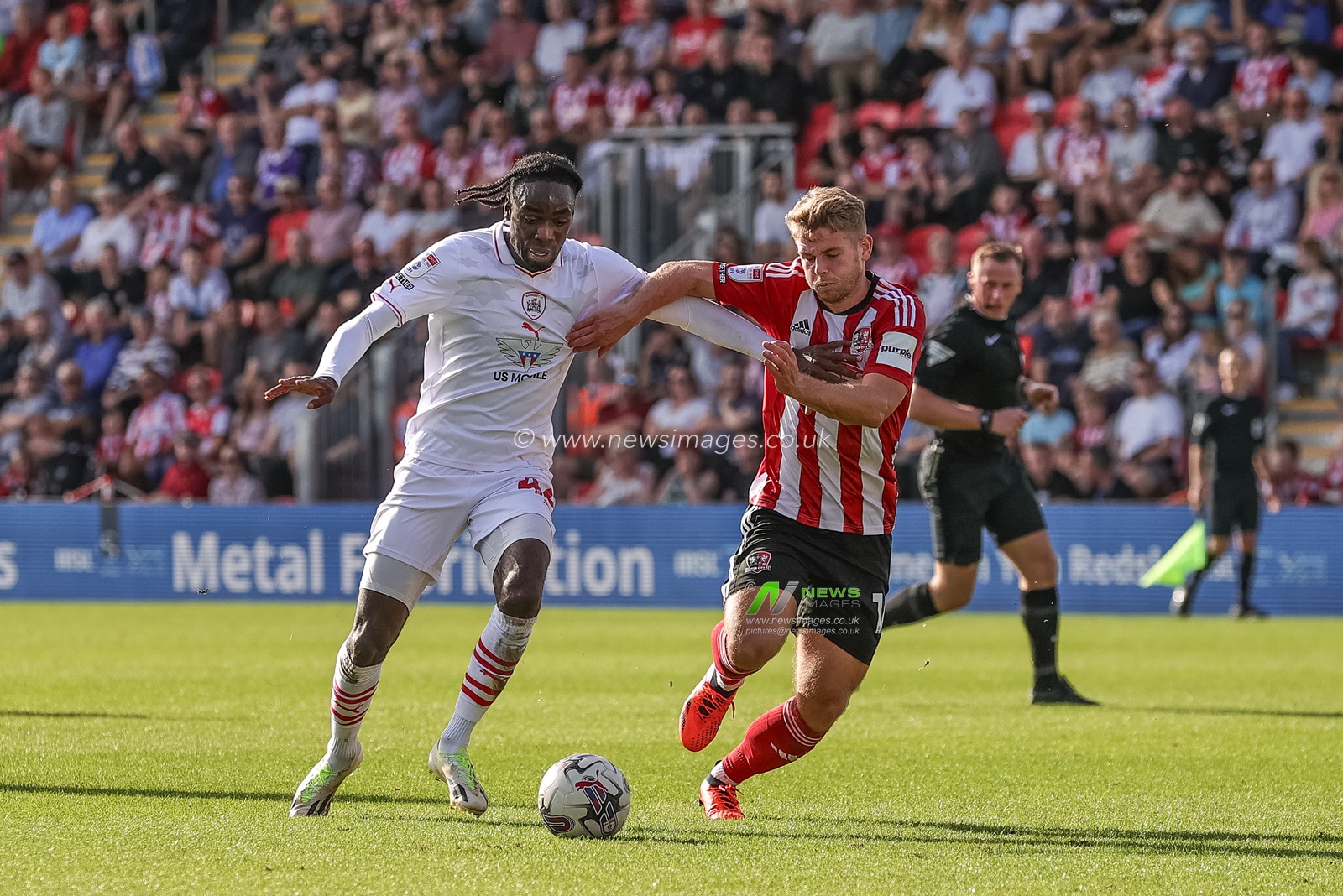Devante Cole #44 of Barnsley breaks with the ball during the Sky Bet League 1 match Exeter City vs Barnsley at St James' Park, Exeter, United Kingdom, 7th October 2023

(Photo by Mark Cosgrove/News Images)