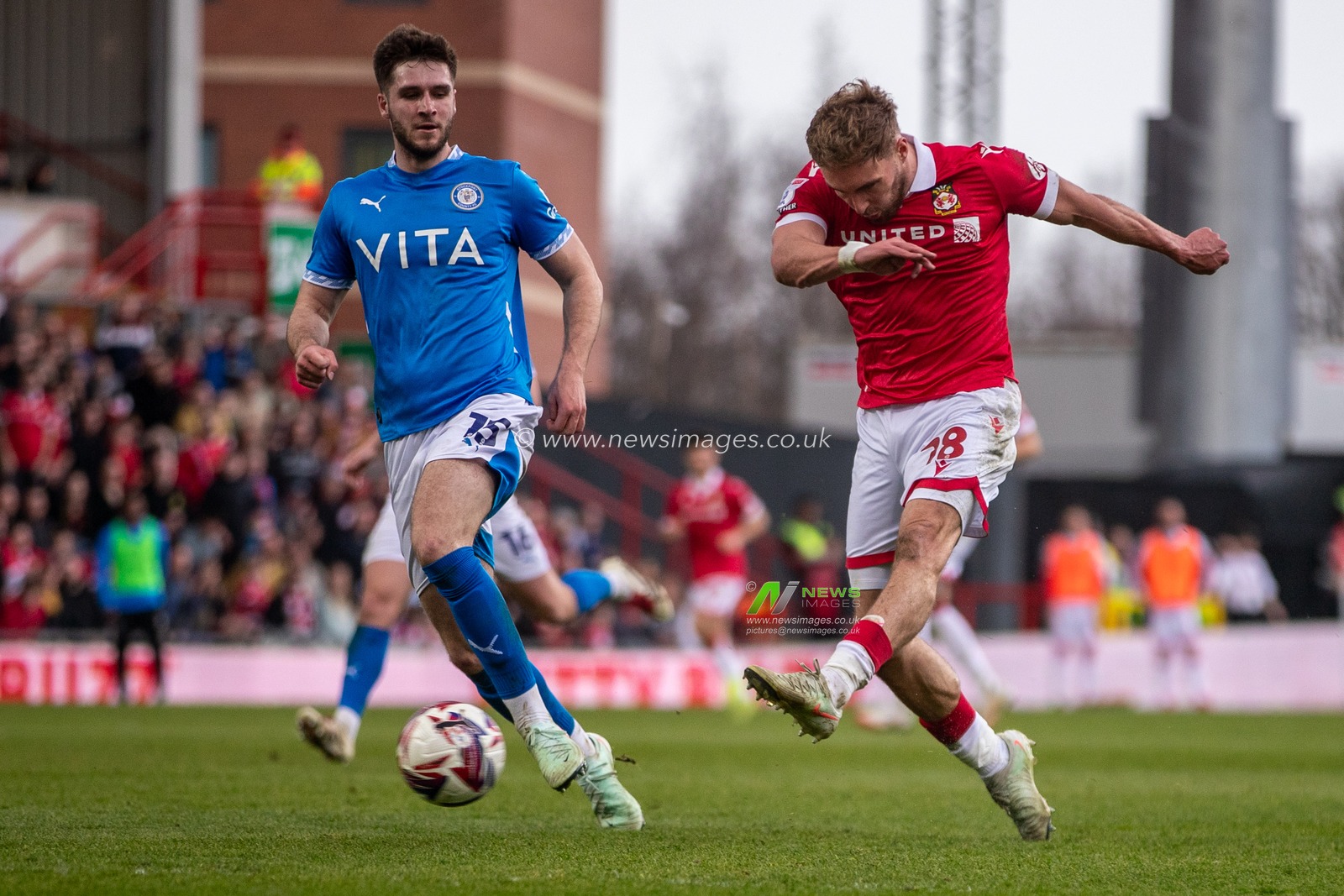 Wrexham's Sam Smith  shoots towards goal during the Sky Bet League 1 match Wrexham vs Stockport County at SToK Cae Ras, Wrexham, United Kingdom, 22nd March 2025

(Photo by Nik Mesney/News Images)