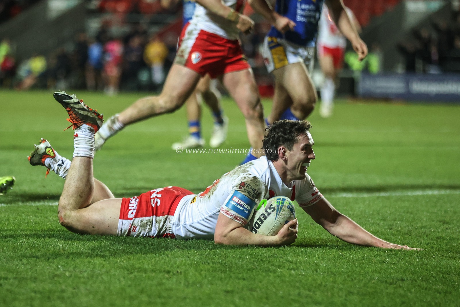 Matt Whitley of St. Helens goes over for a try during the Betfred Challenge Cup match St Helens vs Leeds Rhinos at Totally Wicked Stadium, St Helens, United Kingdom, 14th March 2025

(Photo by Alfie Cosgrove/News Images)