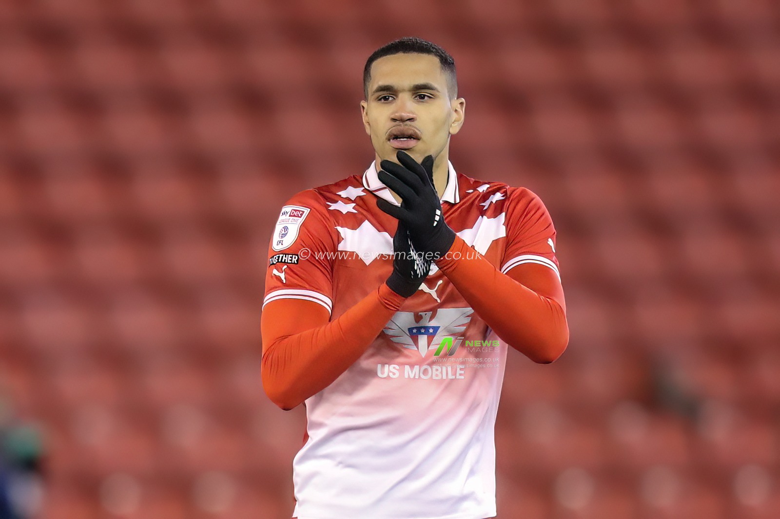 Jon Russell of Barnsley applauds the home fans after a 2-1 win during the Sky Bet League 1 match Barnsley vs Carlisle United at Oakwell, Barnsley, United Kingdom, 16th January 2024

(Photo by Alfie Cosgrove/News Images)