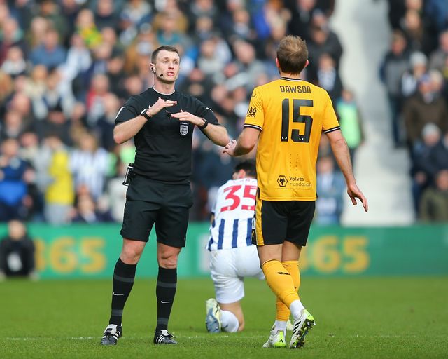 Referee Thomas Bramall speaks with Craig Dawson of Wolverhampton Wanderers, during the Emirates FA Cup Fourth Round match West Bromwich Albion vs Wolverhampton Wanderers at The Hawthorns, West Bromwich, United Kingdom, 28th January 2024

(Photo by Gareth Evans/News Images)