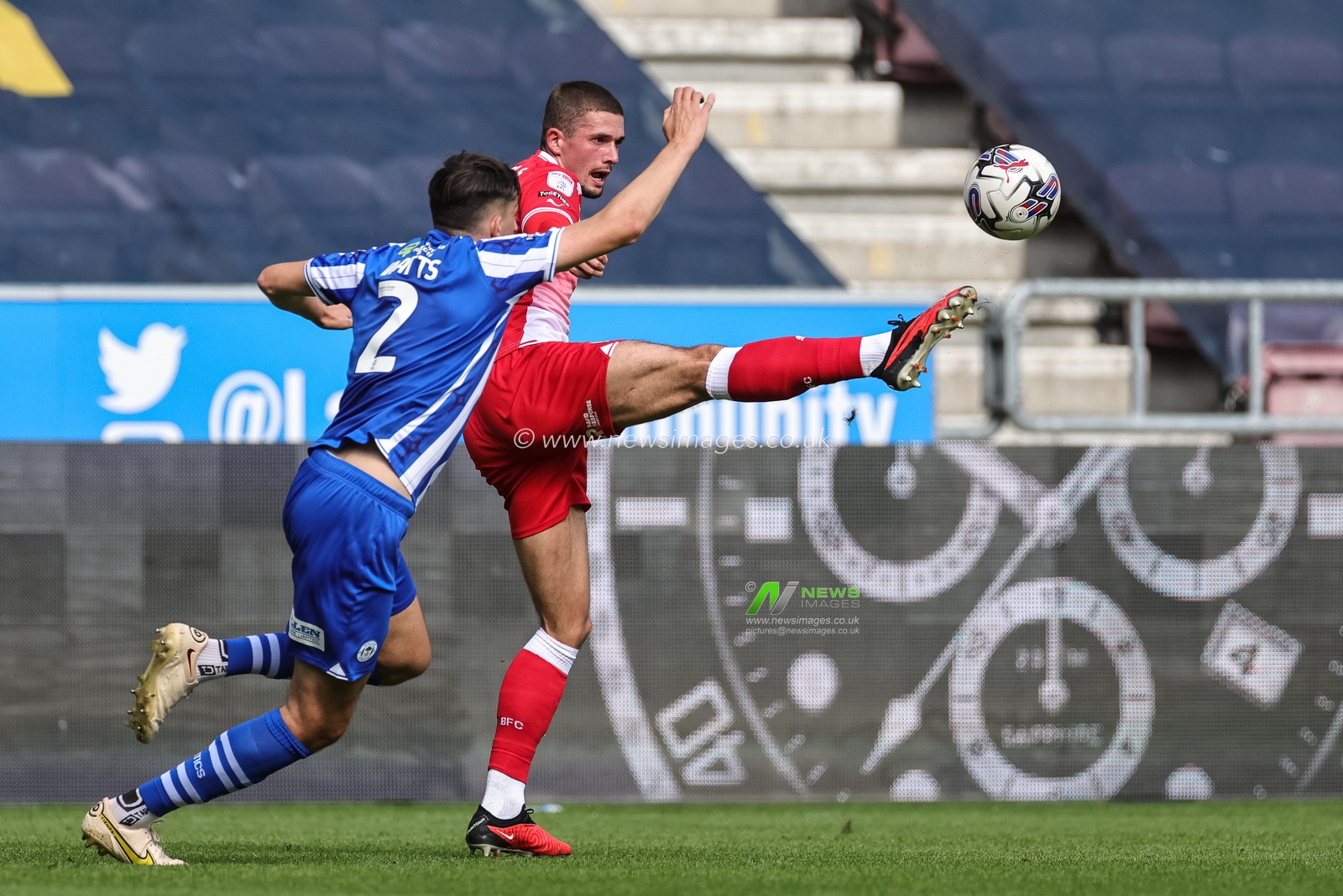 Adam Phillips #30 of Barnsley wins the ball from Kelland Watts #2 of Wigan Athletic during the Sky Bet League 1 match Wigan Athletic vs Barnsley at DW Stadium, Wigan, United Kingdom, 26th August 2023

(Photo by Mark Cosgrove/News Images)