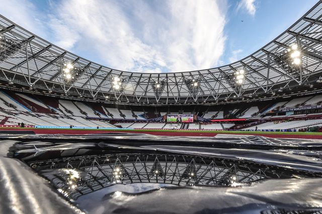 A reflection of the London Stadium through a puddle during the Premier League match West Ham United vs Brentford at London Stadium, London, United Kingdom, 20th October 2025

(Photo by Mark Cosgrove/News Images)