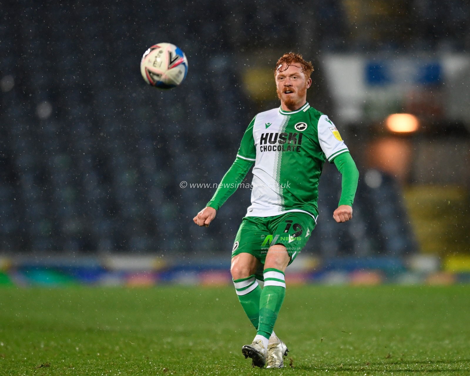 Ryan Woods #19 of Millwall passes the ball
