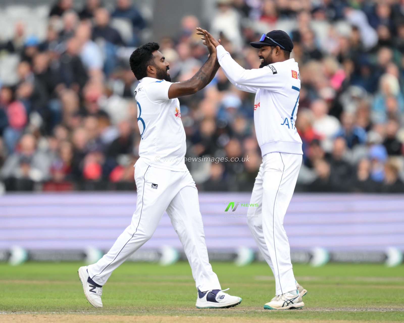 Asitha Fernando of Sri Lanka celebrates bowling out Ollie Pope of England during the England Men v Sri Lanka 1st Rothesay Test Match Day 2 at Old Trafford, Manchester, United Kingdom, 22nd August 2024

(Photo by Craig Thomas/News Images)