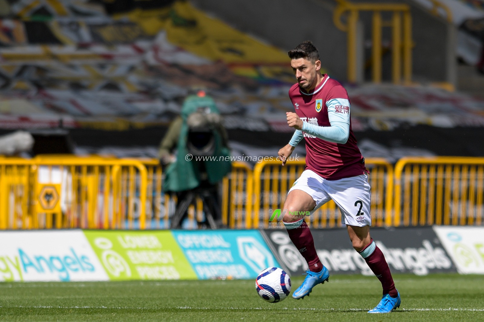 Matthew Lowton #2 of Burnley runs forward with the ball