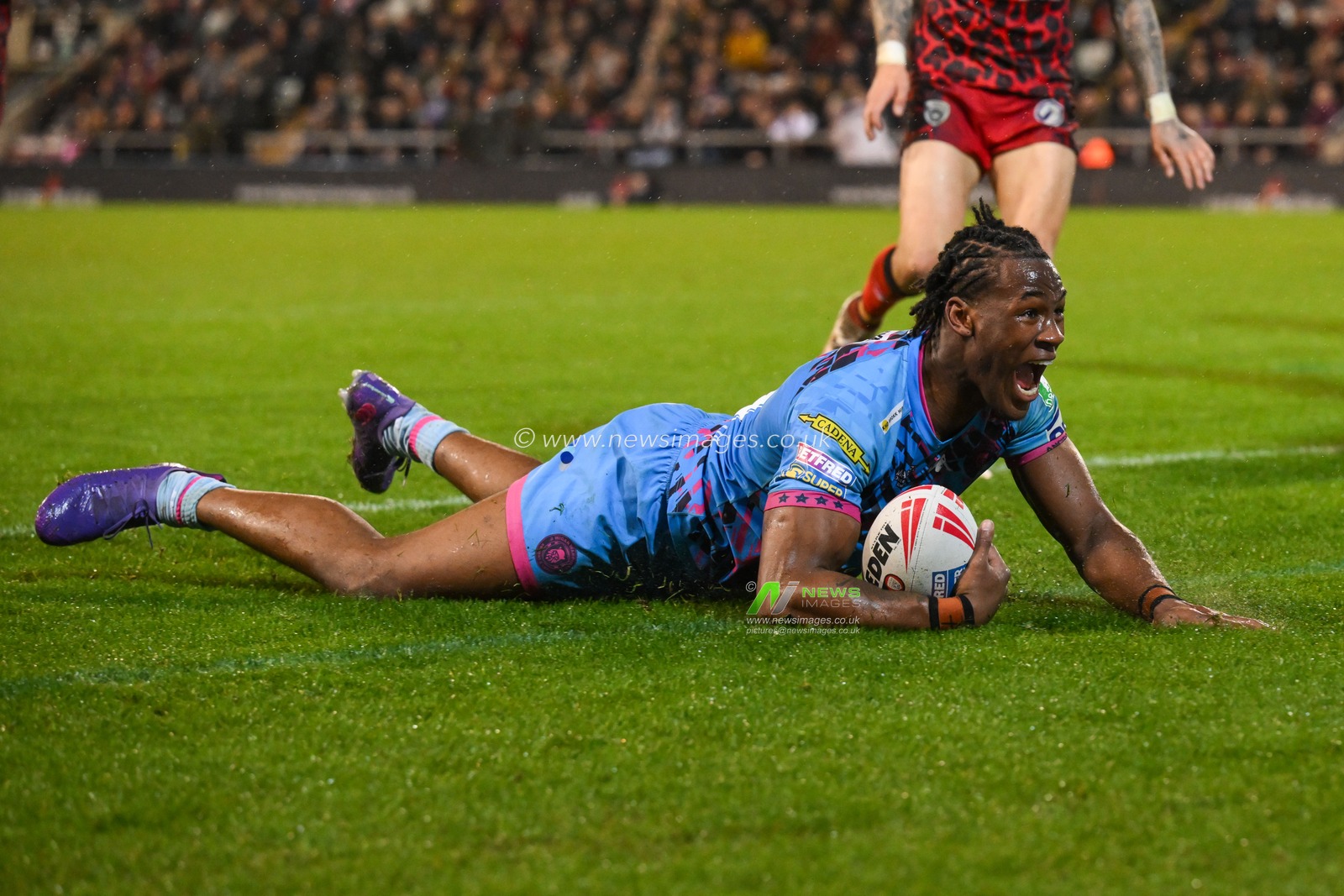 Junior Nsemba of Wigan Warriors goes over for a try during the Betfred Super League Round 7 match Leigh Leopards vs Wigan Warriors at Leigh Sports Village, Leigh, United Kingdom, 4th April 2024

(Photo by Craig Thomas/News Images)