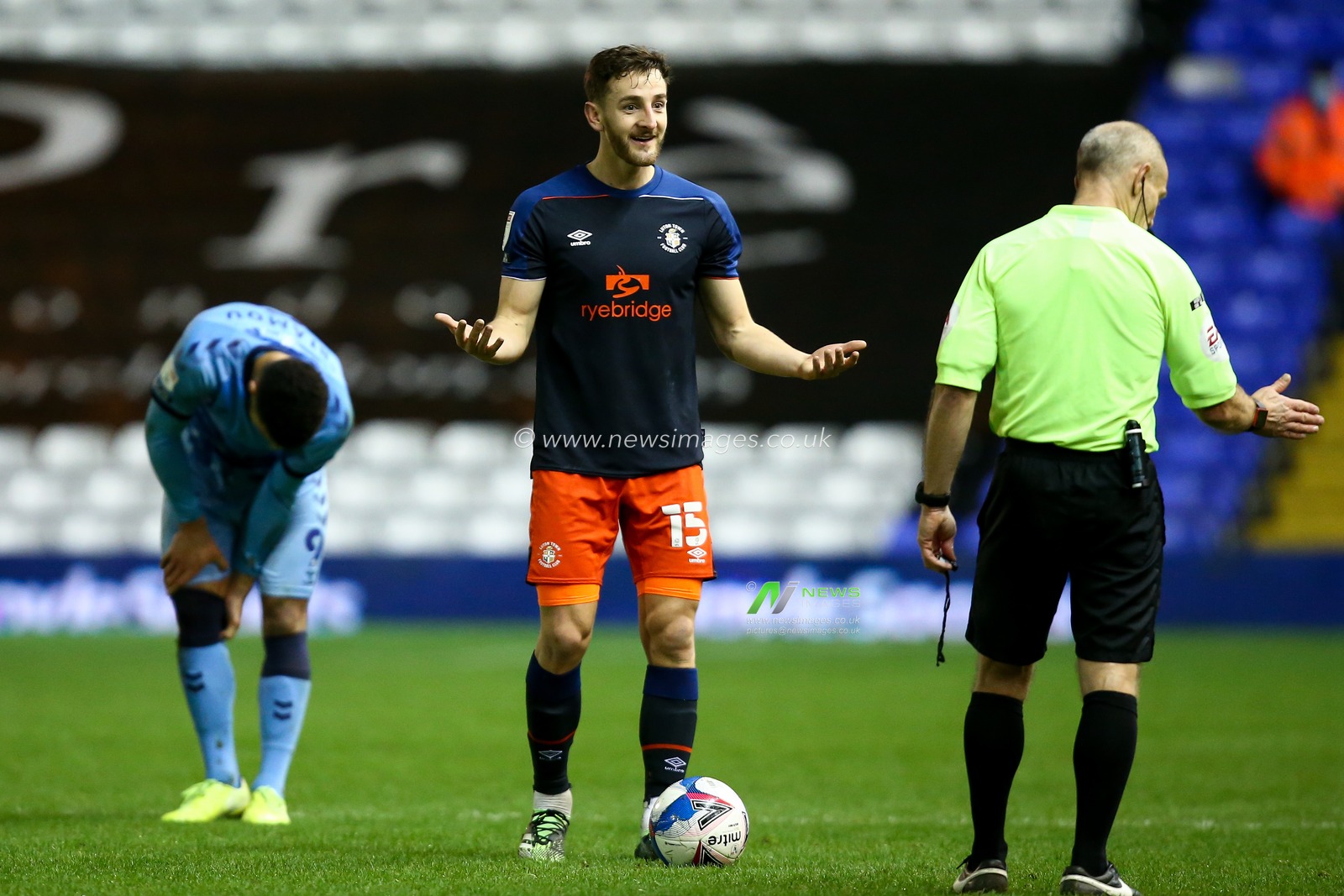 Tom Lockyer #15 of Luton Town pleads with the referee
