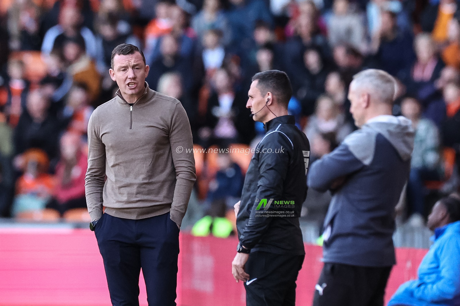 Neill Collins Head coach of Barnsley reacts in the technical area during the Sky Bet League 1 match Blackpool vs Barnsley at Bloomfield Road, Blackpool, United Kingdom, 20th April 2024

(Photo by Mark Cosgrove/News Images)