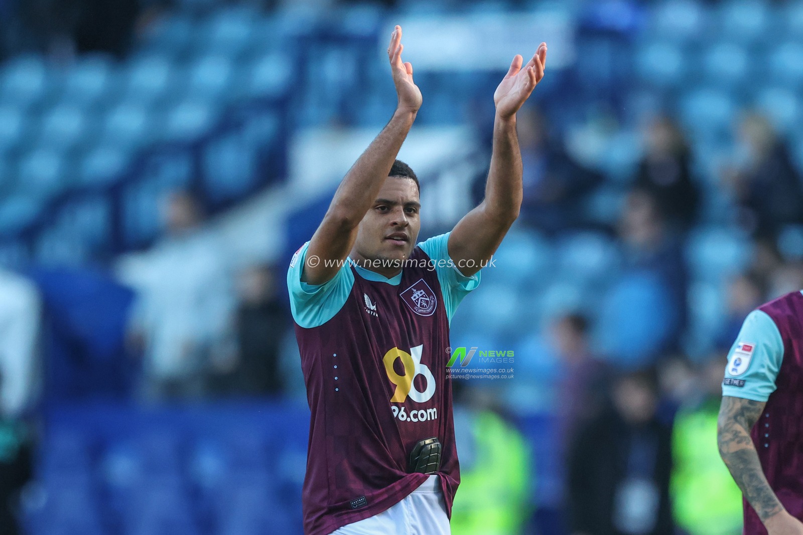 CJ Egan-Riley of Burnley applauds the travelling fans after the game during the Sky Bet Championship match Sheffield Wednesday vs Burnley at Hillsborough, Sheffield, United Kingdom, 19th October 2024

(Photo by Alfie Cosgrove/News Images)