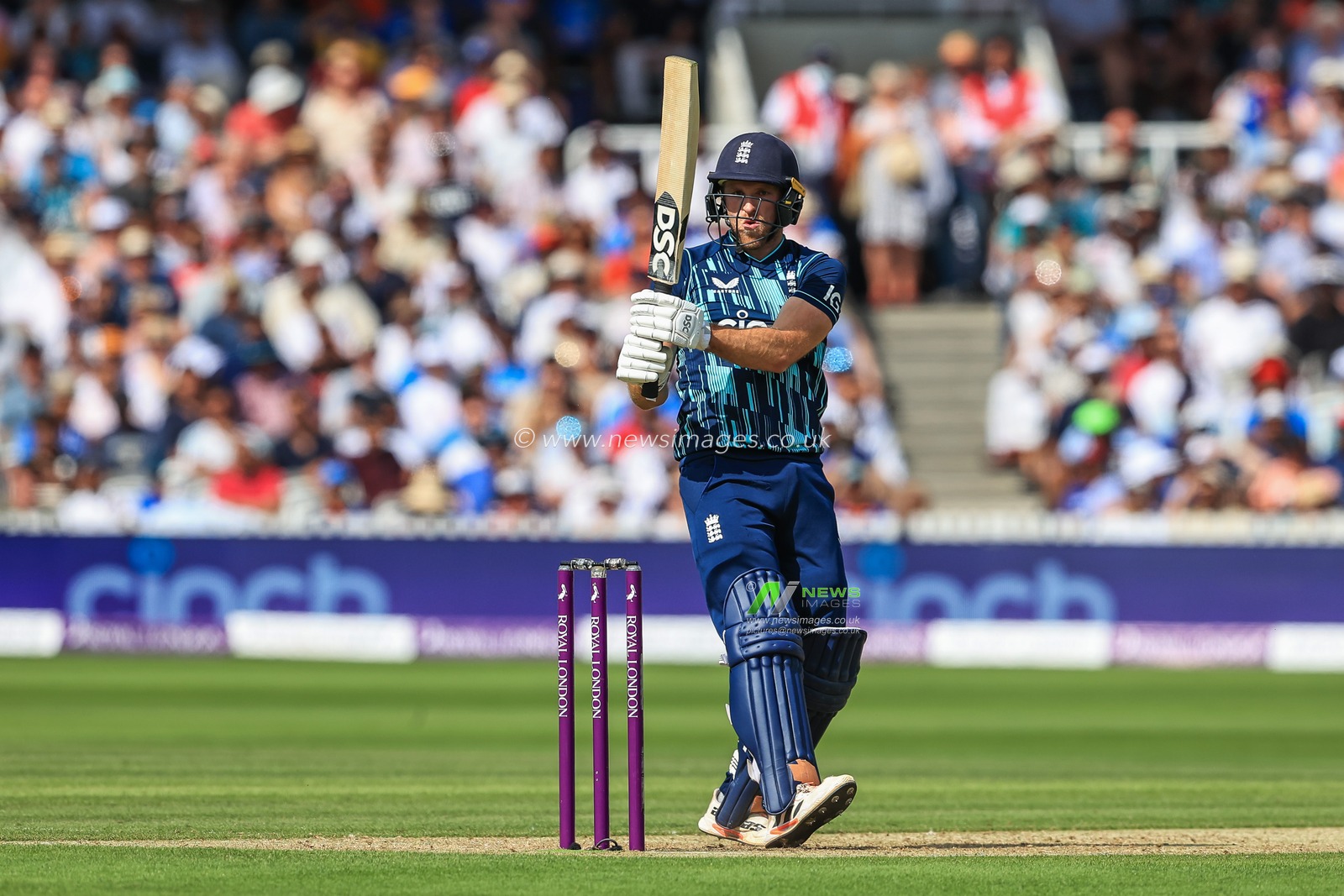 David Willey of England hits a boundary