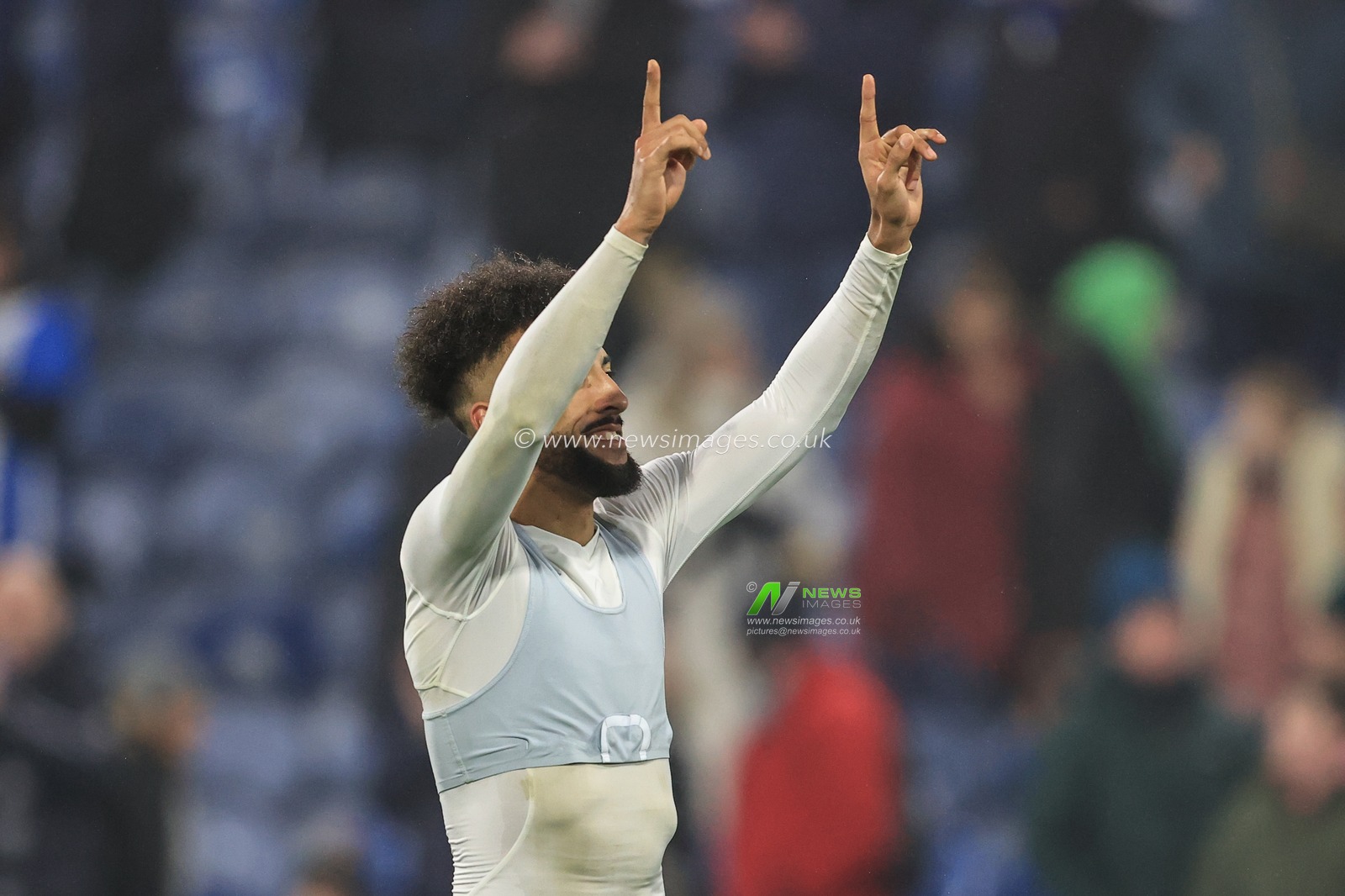 Sorba Thomas #16 of Huddersfield Town celebrates with the fans after winning 3-2