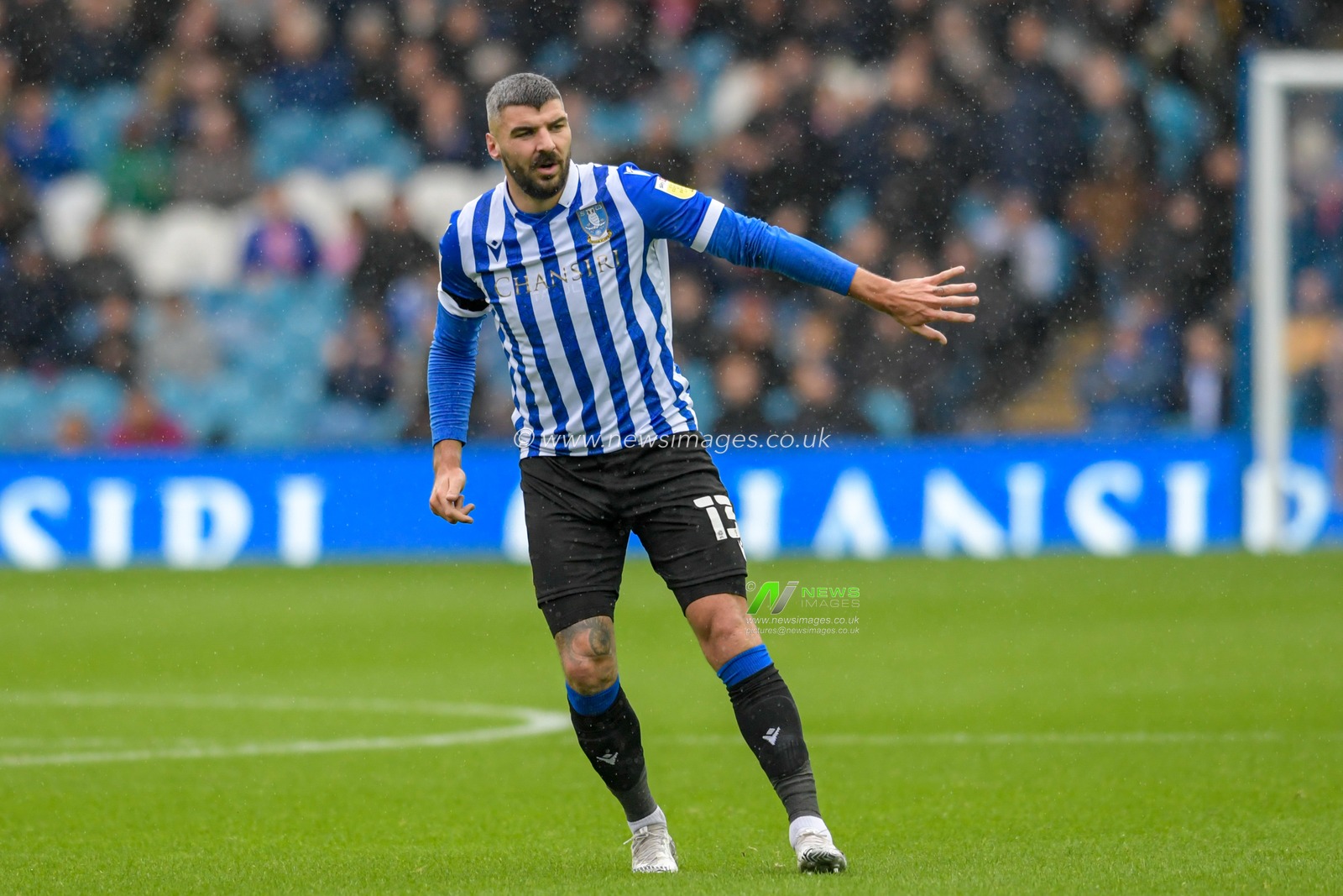 Callum Paterson #13 of Sheffield Wednesday gives instructions during the game