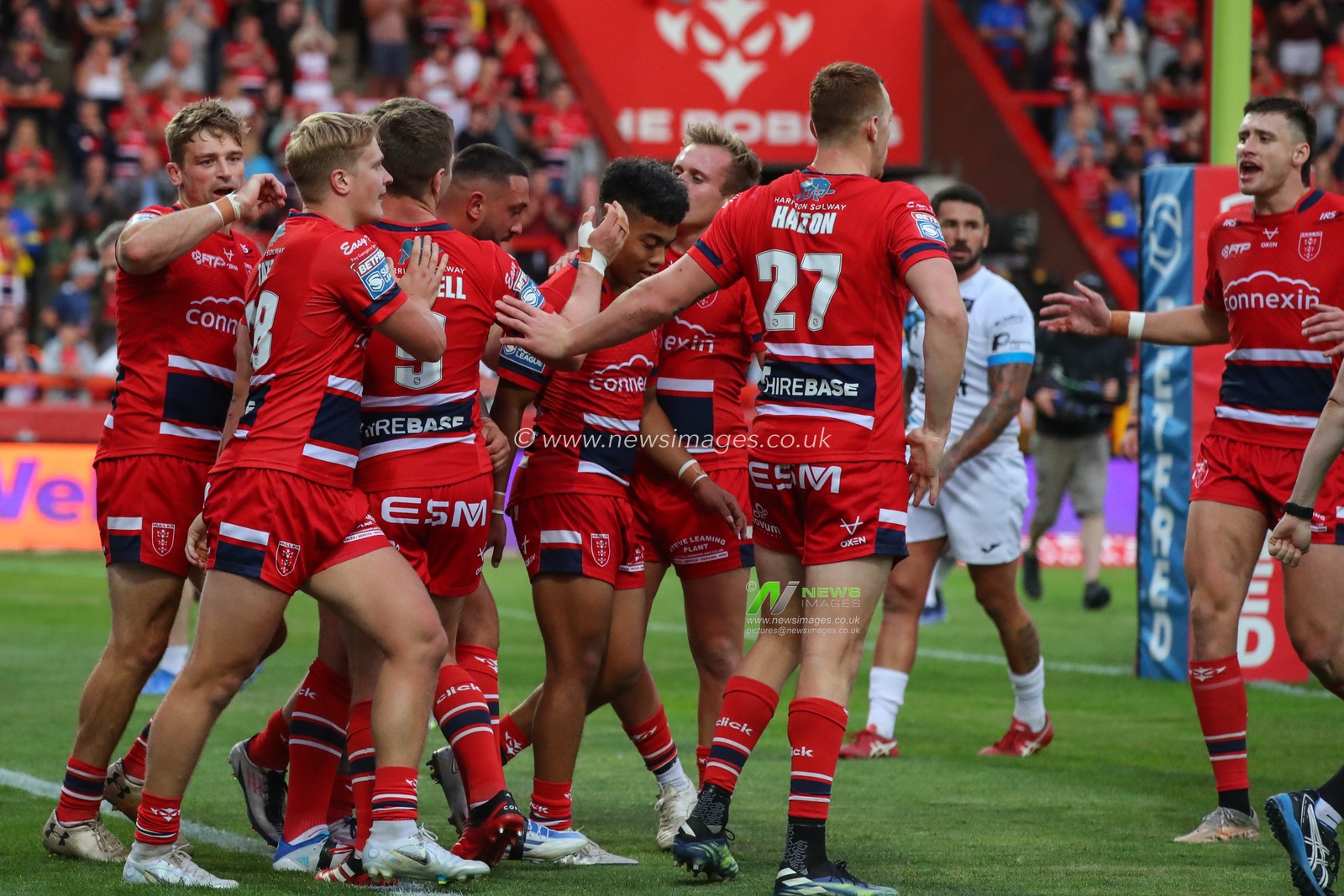 Elliot Minchella #17 of Hull KR celebrates his try in the first half