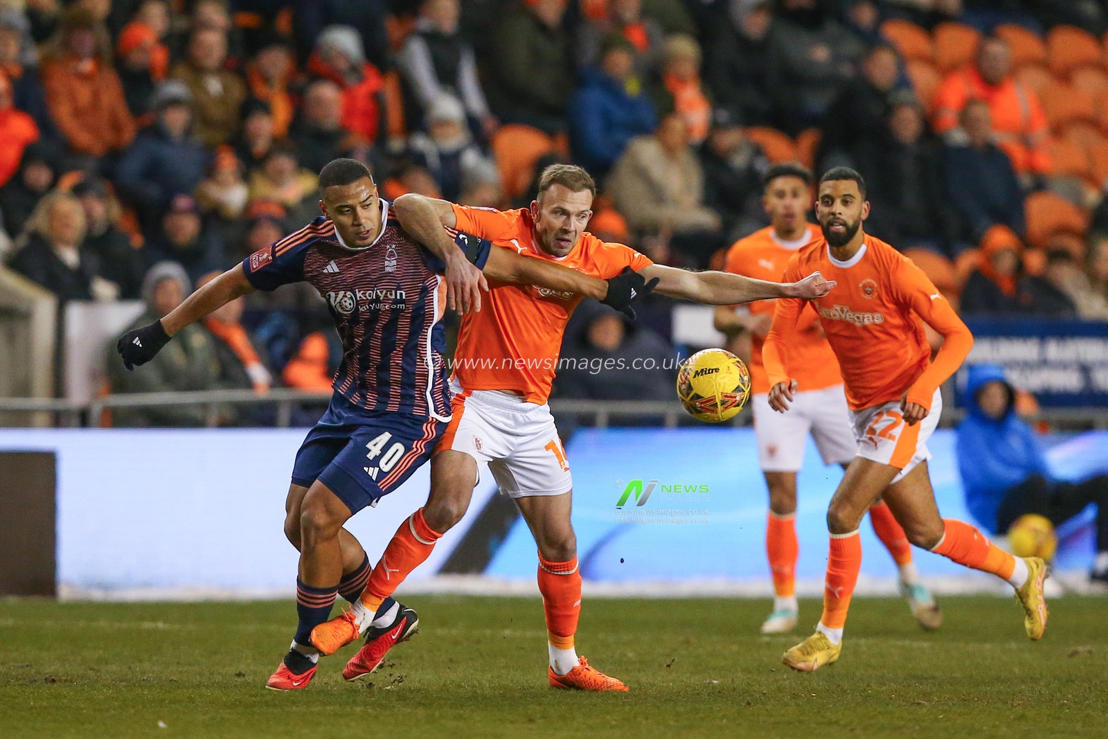 Murillo of Nottingham Forest and Jordan Rhodes of Blackpool battle for the ball during the Emirates FA Cup Third Round Replay match Blackpool vs Nottingham Forest at Bloomfield Road, Blackpool, United Kingdom, 17th January 2024

(Photo by Gareth Evans/News Images)