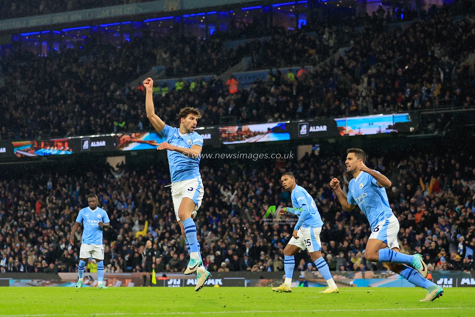 RÃºben Dias #3 of Manchester City celebrates his side's goal to make it 1-1 during the Premier League match Manchester City vs Tottenham Hotspur at Etihad Stadium, Manchester, United Kingdom, 3rd December 2023

(Photo by Conor Molloy/News Images)