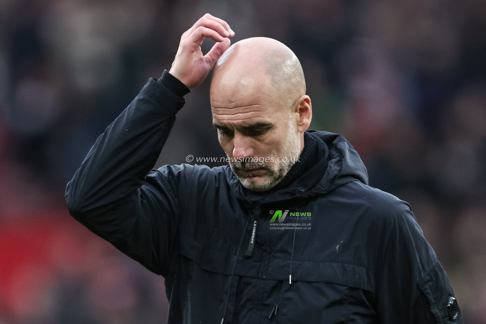 A dejected Pep Guardiola manager of Manchester City walks over to the fans during the Premier League match Manchester United vs Manchester City at Old Trafford, Manchester, United Kingdom, 17th January 2026

(Photo by Mark Cosgrove/News Images)