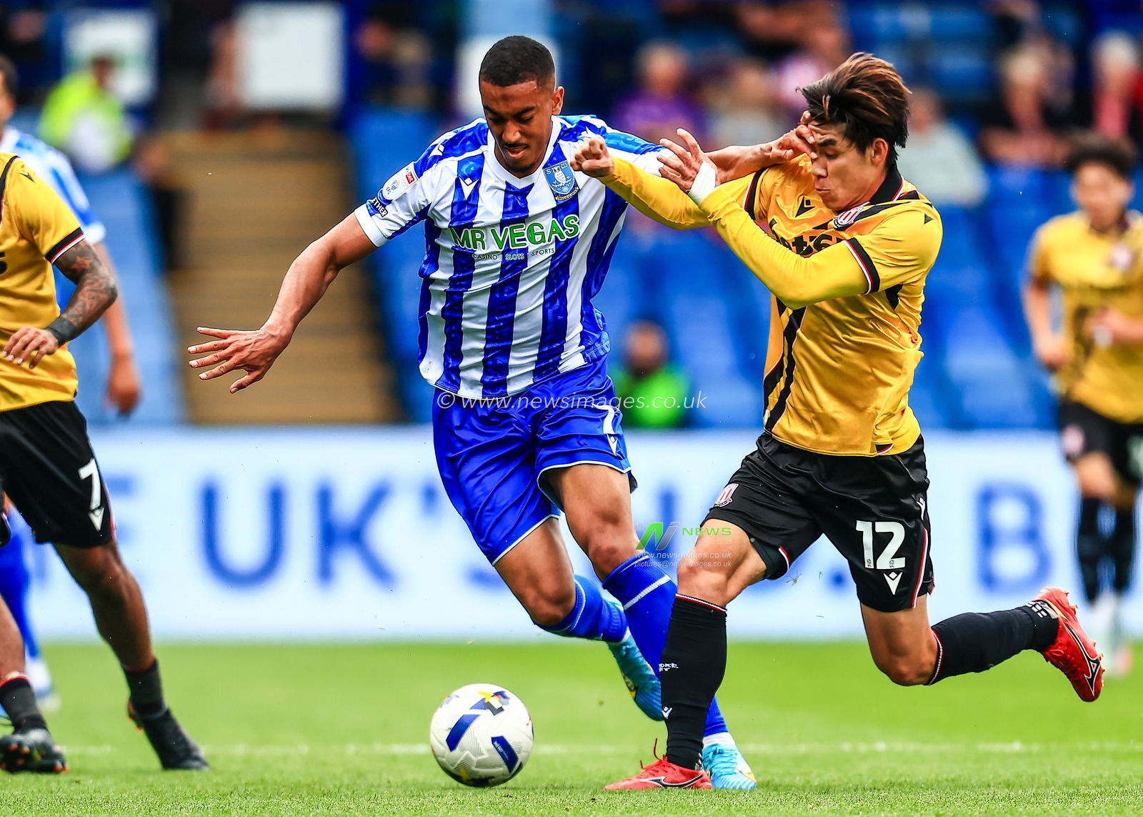 Yan Valery of Sheffield Wednesday holds off Tatsuki Seko of Stoke City during the Sky Bet Championship match Sheffield Wednesday vs Stoke City at Hillsborough, Sheffield, United Kingdom, 16th August 2025

(Photo by Richard Bierton/News Images)