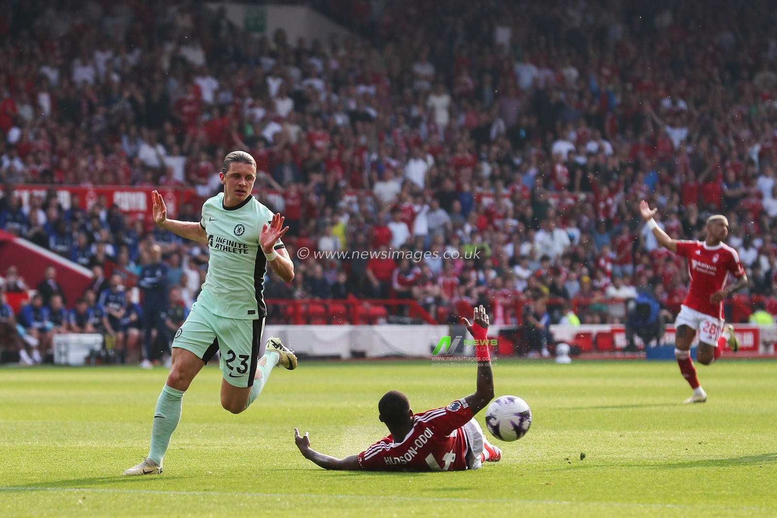 Conor Gallagher of Chelsea fouls Callum Hudson-Odoi of Nottingham Forest during the Premier League match Nottingham Forest vs Chelsea at City Ground, Nottingham, United Kingdom, 11th May 2024

(Photo by Gareth Evans/News Images)