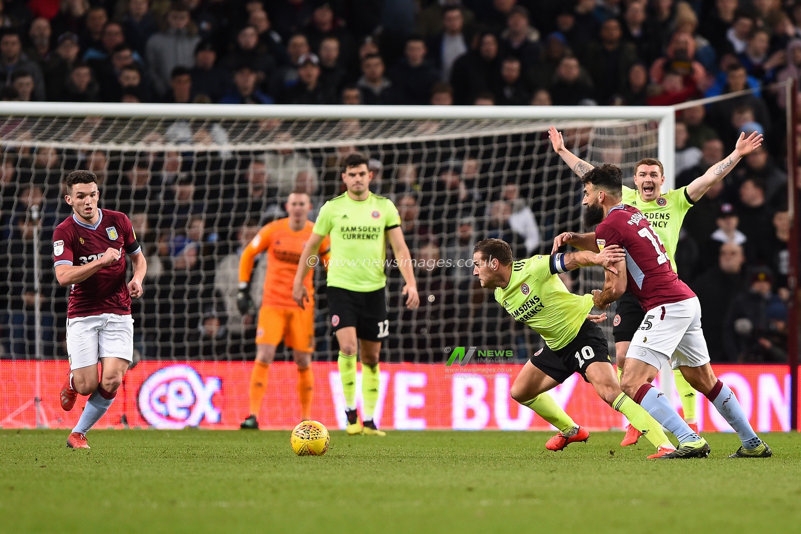 8th February 2019, Villa Park, Birmingham, England ; Sky Bet Championship, Aston Villa v Sheffield United : Billy Sharp (10) of Sheffield United battles with Mile Jedinak (15) of Aston Villa 

Credit: Jon Hobley/News Images

English Football League images are subject to DataCo Licence