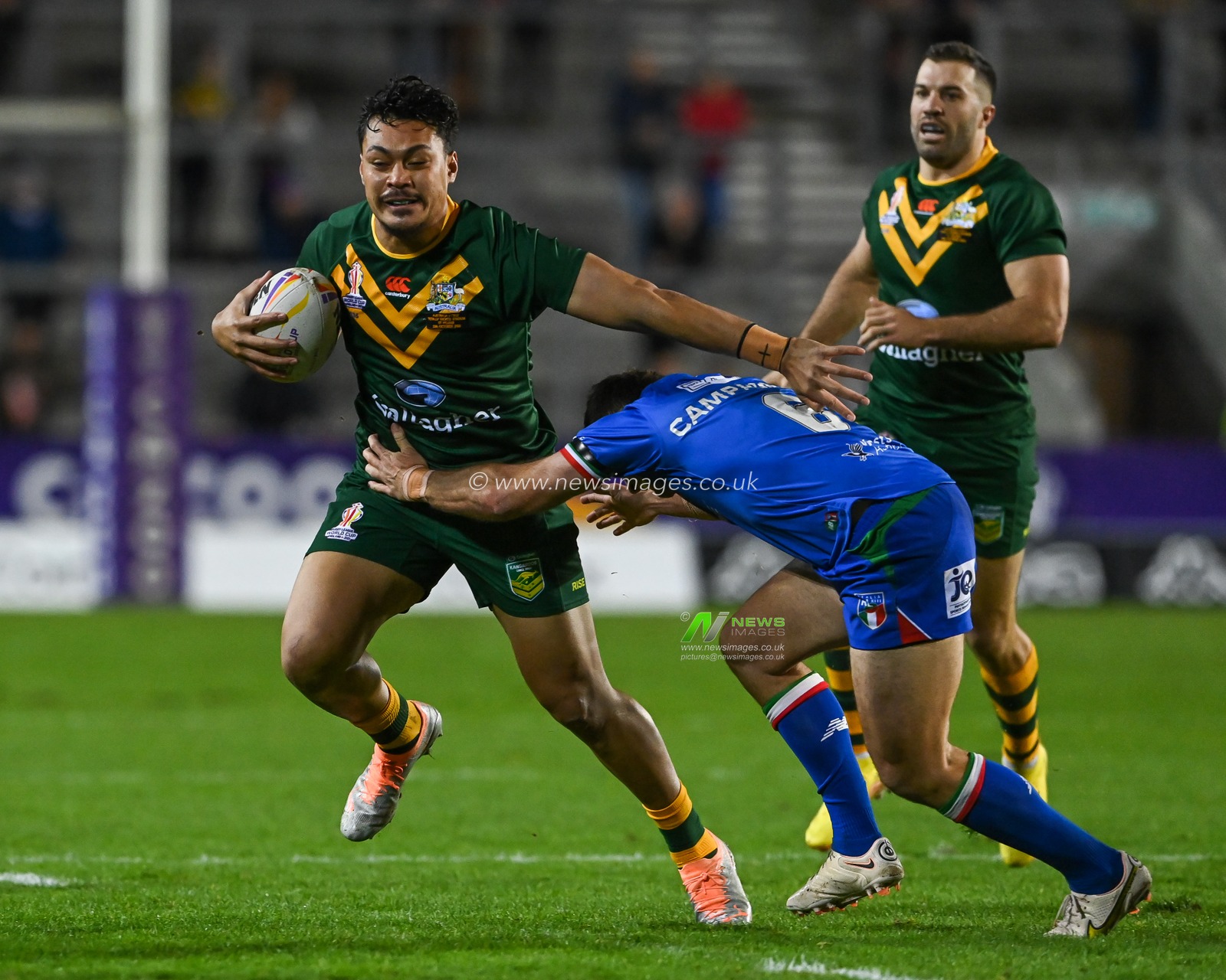 Jeremiah Nanai of Australia is tackled by Jack Campagnolo of Italy during the Rugby League World Cup 2021 match Australia vs Italy at Totally Wicked Stadium, St Helens, United Kingdom, 29th October 2022

(Photo by Craig Thomas/News Images)