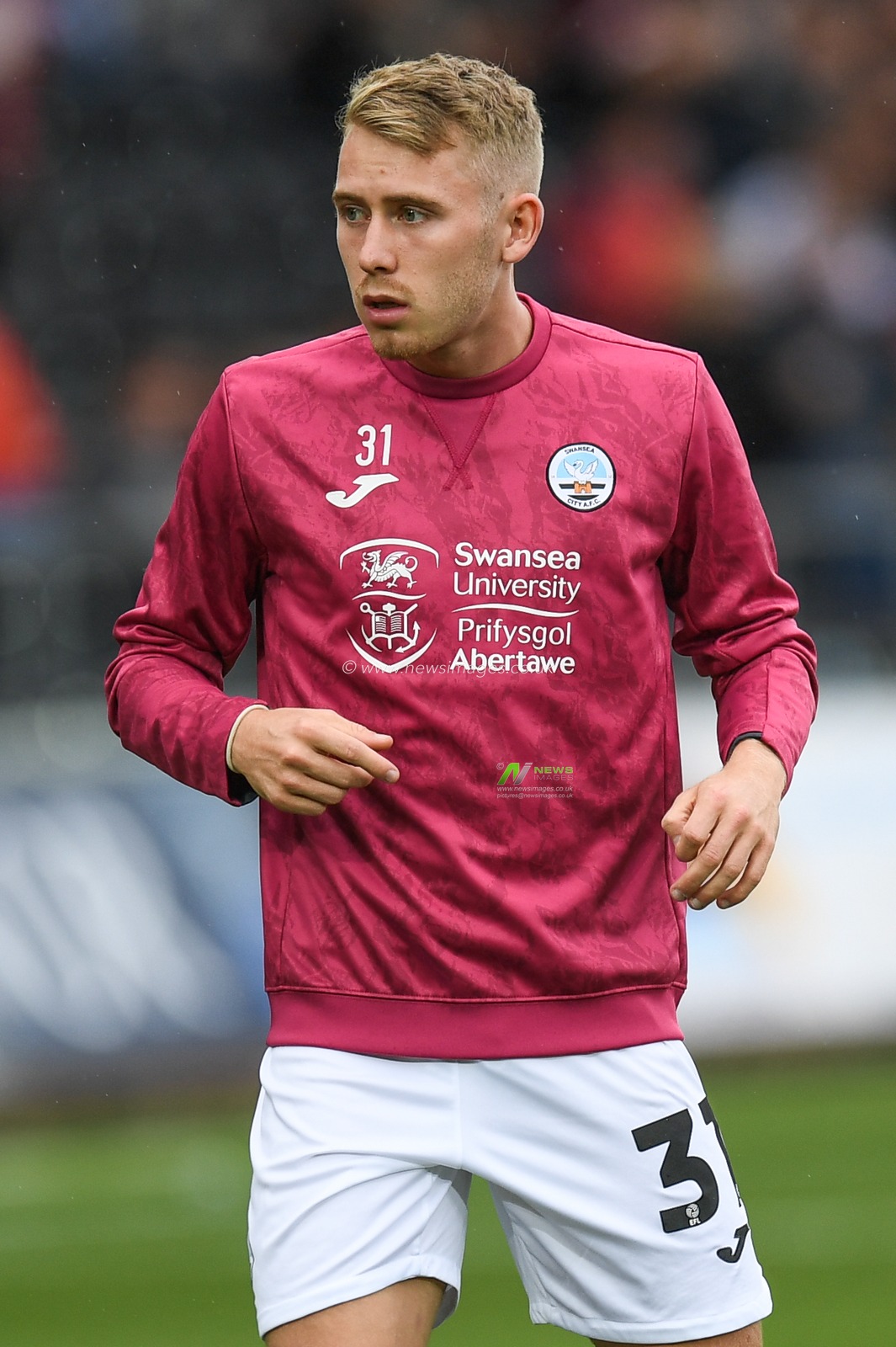 Ollie Cooper #31 of Swansea City  during the pre-game warmup during the Sky Bet Championship match Swansea City vs Queens Park Rangers at Swansea.com Stadium, Swansea, United Kingdom, 3rd September 2022

(Photo by Mike Jones/News Images)