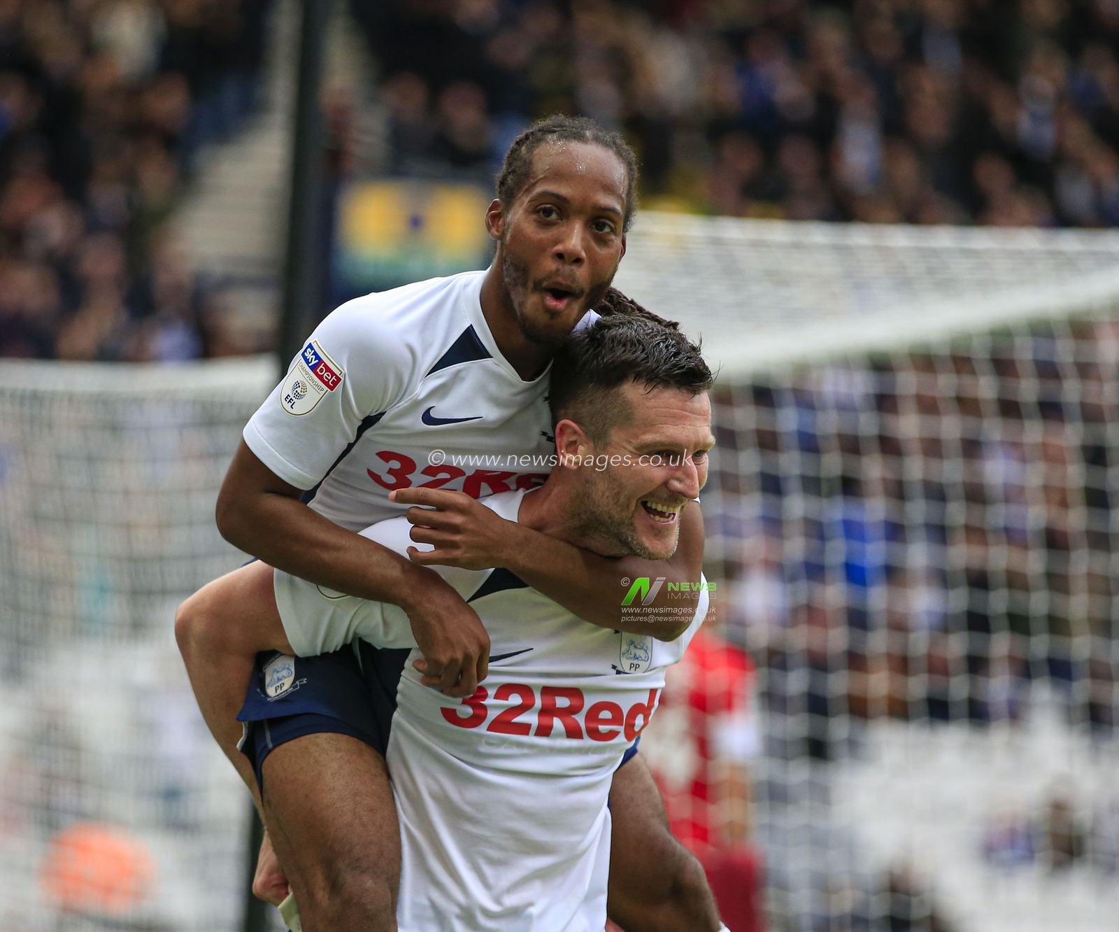 5th October 2019, Deepdale, Preston, England; Sky Bet Championship, Preston North End v Barnsley : Daniel Johnson (11) of Preston North End celebrates with David Nugent (35) after scoring the third goal in the 61st minute, 3-1 to Preston
Credit: Conor Molloy/News Images