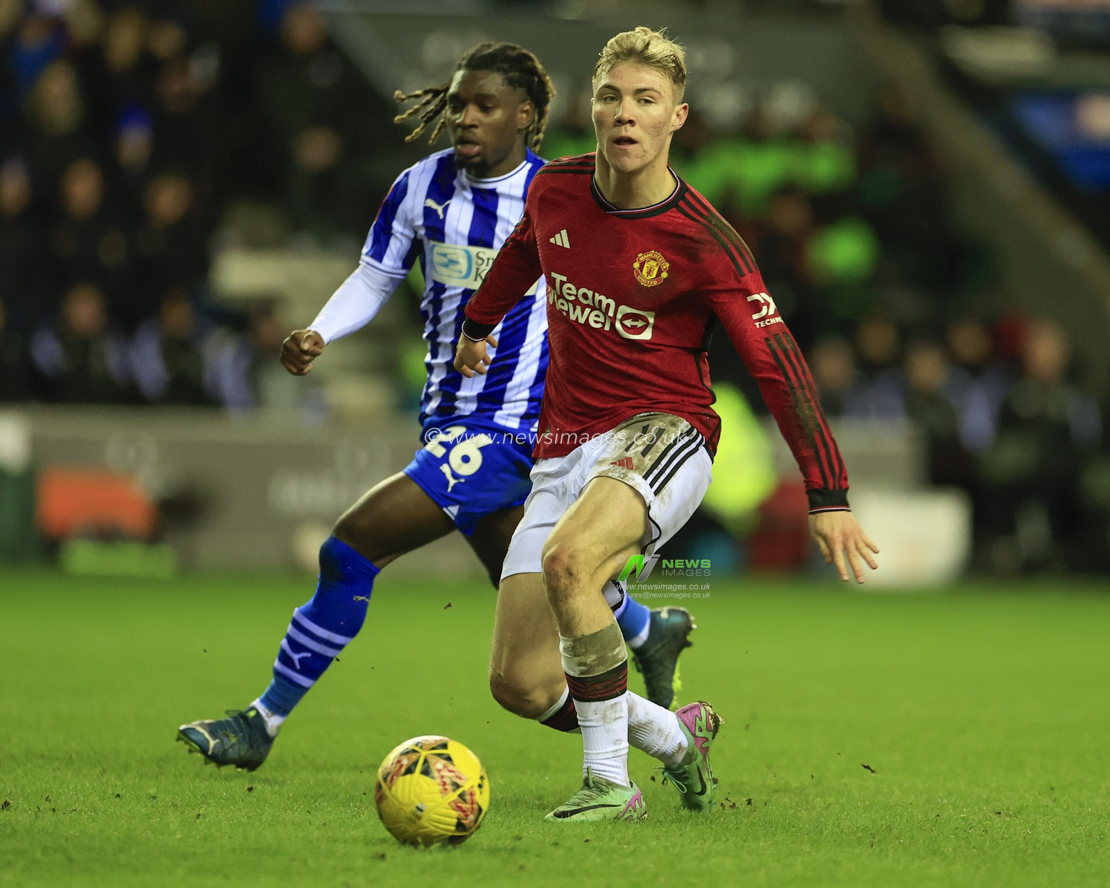 Rasmus Hojlund of Manchester United passes the ball during the Emirates FA Cup Third Round match Wigan Athletic vs Manchester United at DW Stadium, Wigan, United Kingdom, 8th January 2024

(Photo by Conor Molloy/News Images)