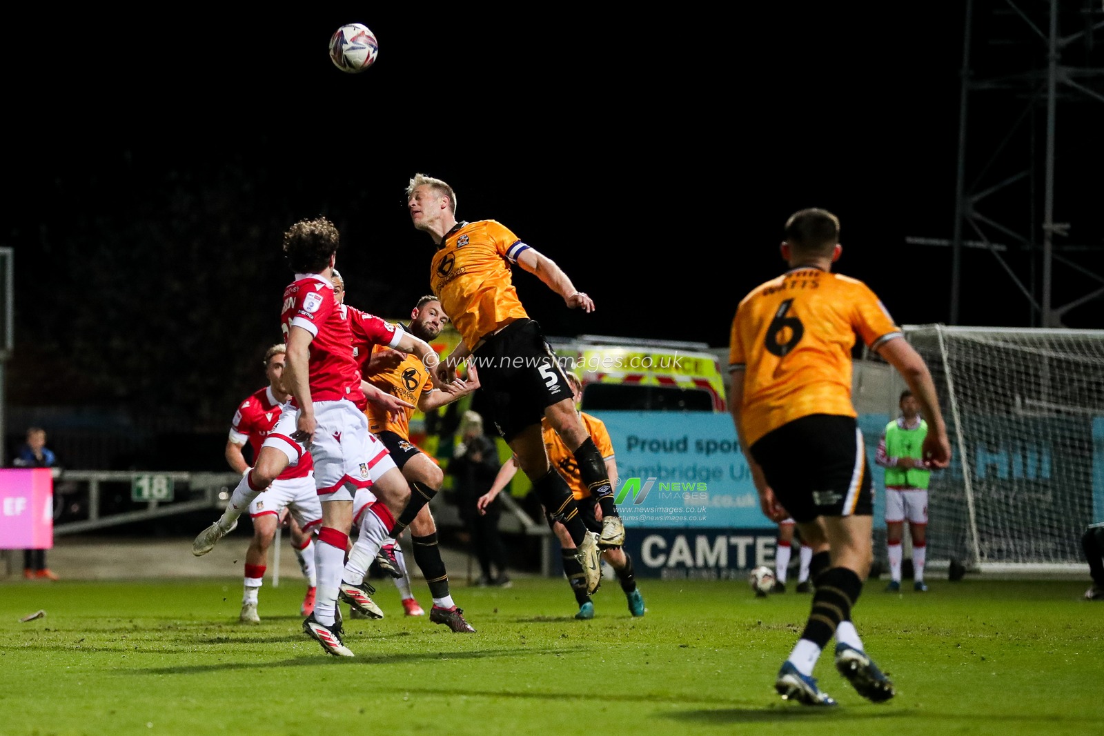 Michael Morrison of Cambridge United heads the ball during the Sky Bet League 1 match Cambridge United vs Wrexham at Abbey Stadium, Cambridge, United Kingdom, 1st April 2025

(Photo by Izzy Poles/News Images)